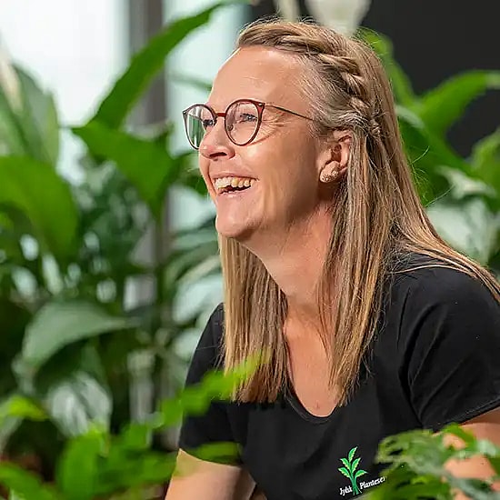 Servicegartner som passer grønne planter,